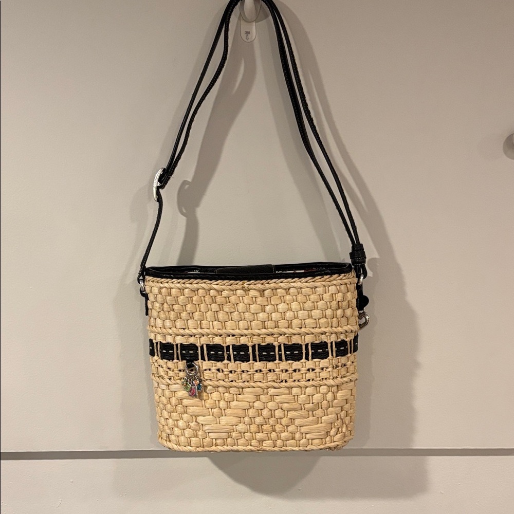 Woven Straw Crossbody Bag with Black Trim and Adjustable Strap